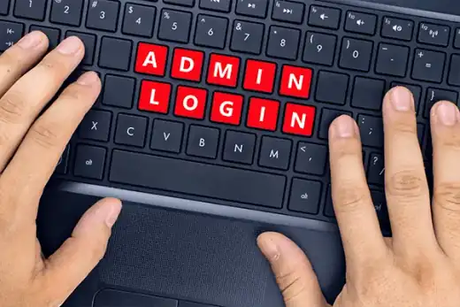 Free-Admin-Access-Encoding-RDP Hands typing on a keyboard with the keys arranged to spell'ADMIN LOGIN,' highlighting the feature of free admin access that's included in all encoding RDP plans offered by Webpundits.